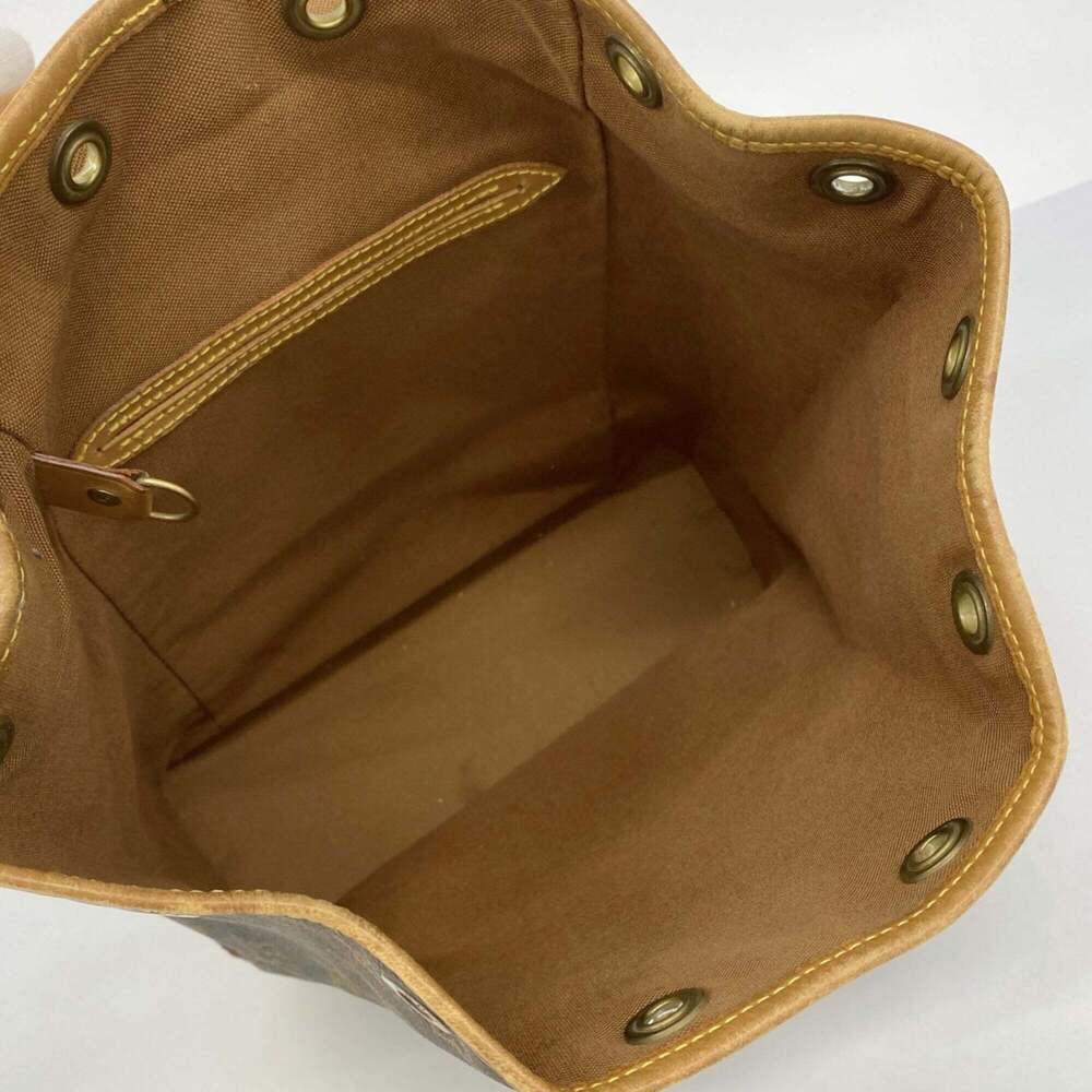 LOUIS VUITTON Brown Monogram Backpack - Picture 4 of 11